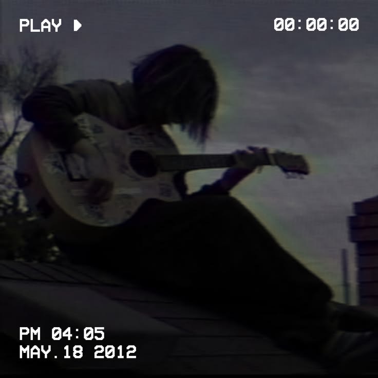 girl playing guitar.
